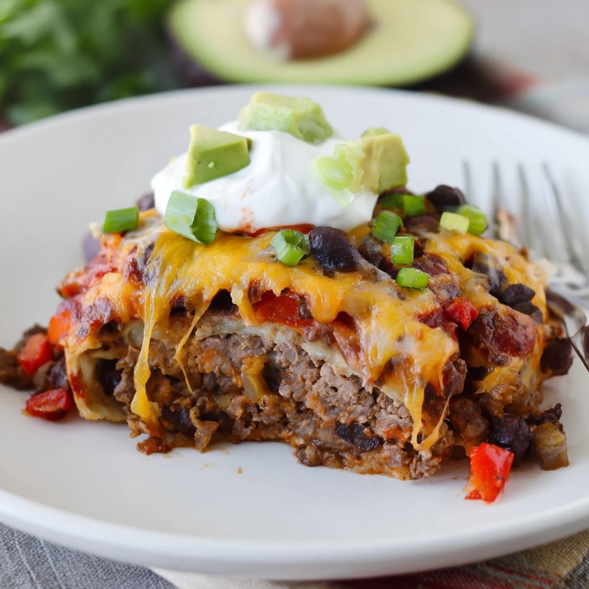 One-pan Beef Skillet Enchiladas with smoky spices, browned beef, and avocado