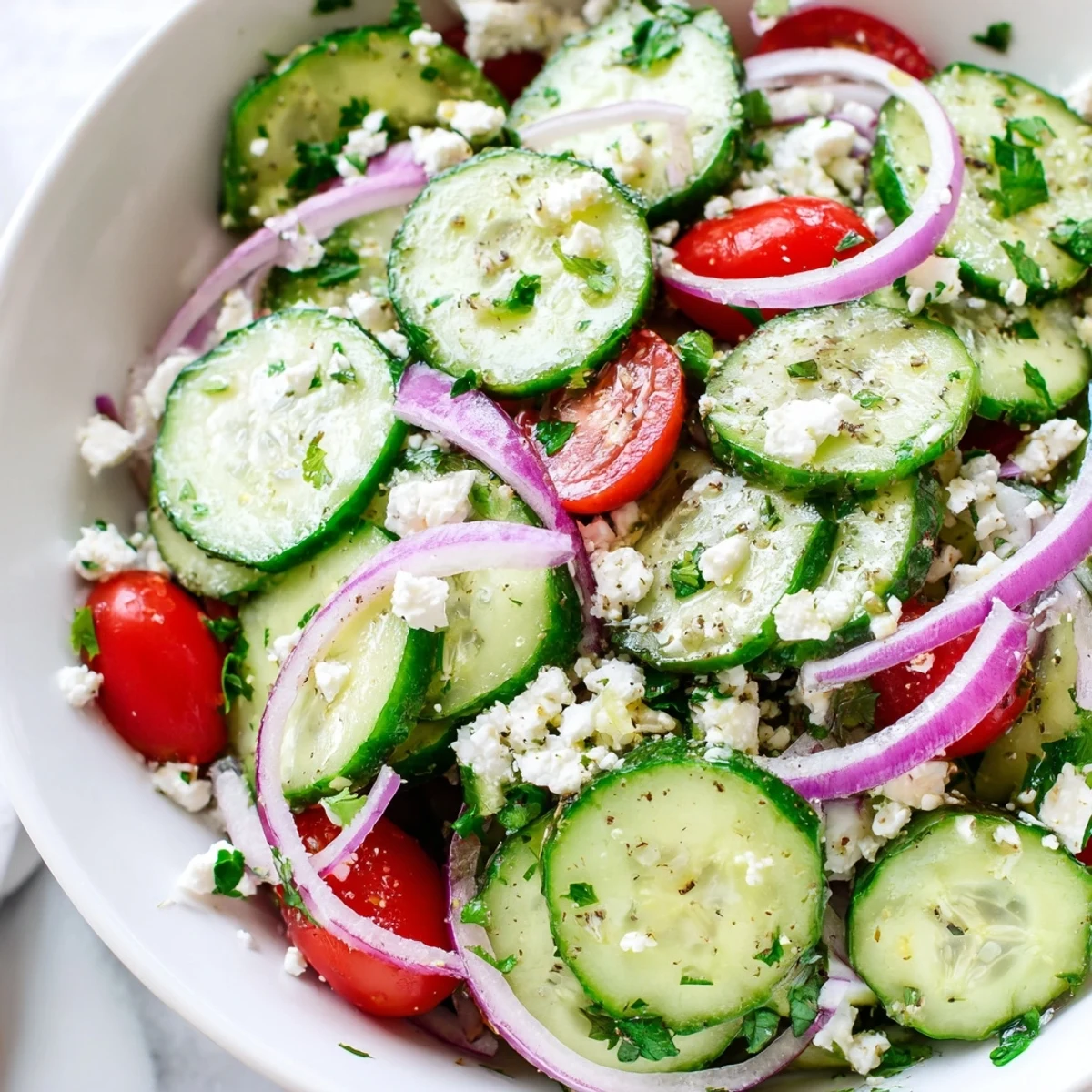 Cucumber Feta Salad With Lemon Greek Vinaigrette, crisp cucumbers and tangy feta.