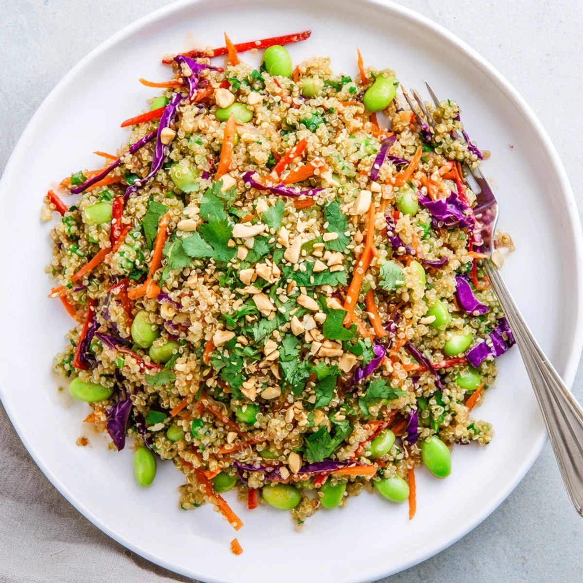 Asian Dressing Quinoa Salad with bright cilantro, crunchy peanuts, and zesty lime
