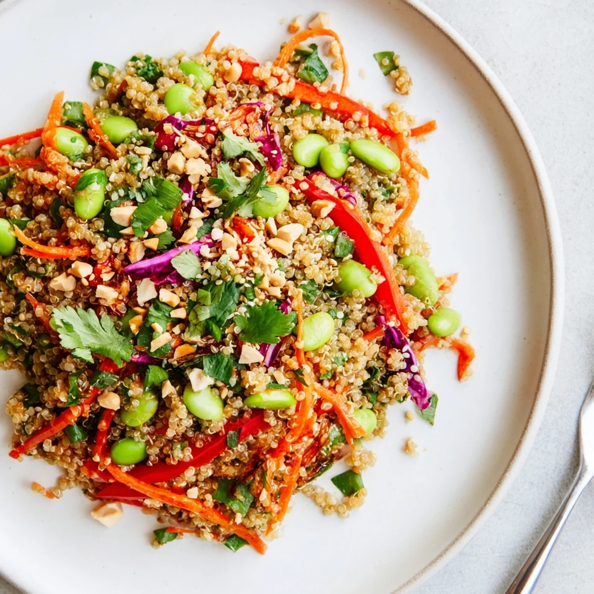 Cold Asian Dressing Quinoa Salad served chilled, tangy ginger, vibrant red cabbage